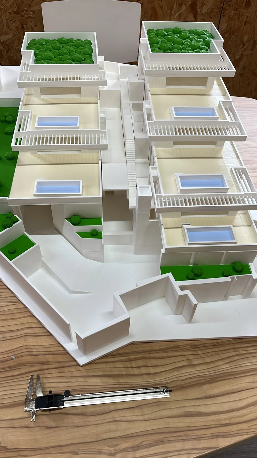 Architectural scale model checked with a caliper for dimensional accuracy — Eolas Prints