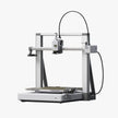 Silver and gray metal frame 3d printer with digital control panel from Bambu Lab A2L shown from front view