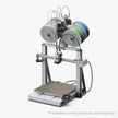 Silver metallic bambu lab a2l 3d printer with multiple blue green and gray filament spools visible from the back side