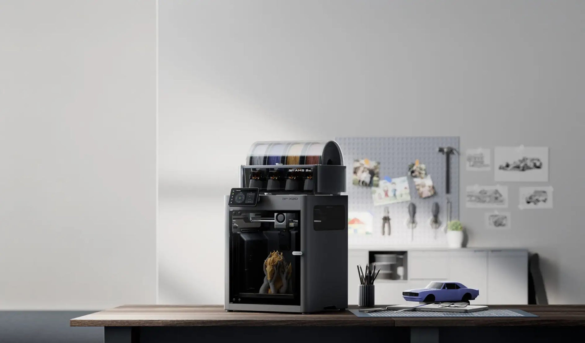 Black 3d printer with transparent front panel and multiple color filament spools on top