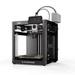 A dark grey, open-frame 3D printer with a top-mounted color touchscreen display and an external filament holder with multi-colored tubes.