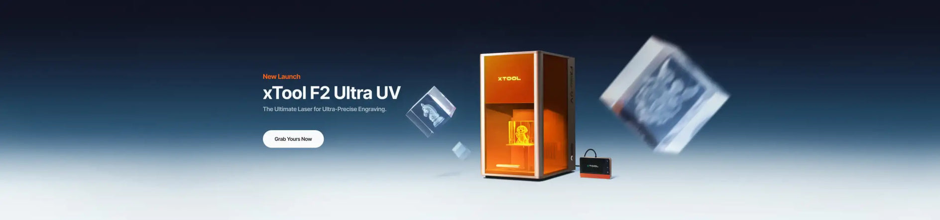 Orange xtool f2 ultra uv 3d printer with a sleek, rectangular design and transparent front panel.