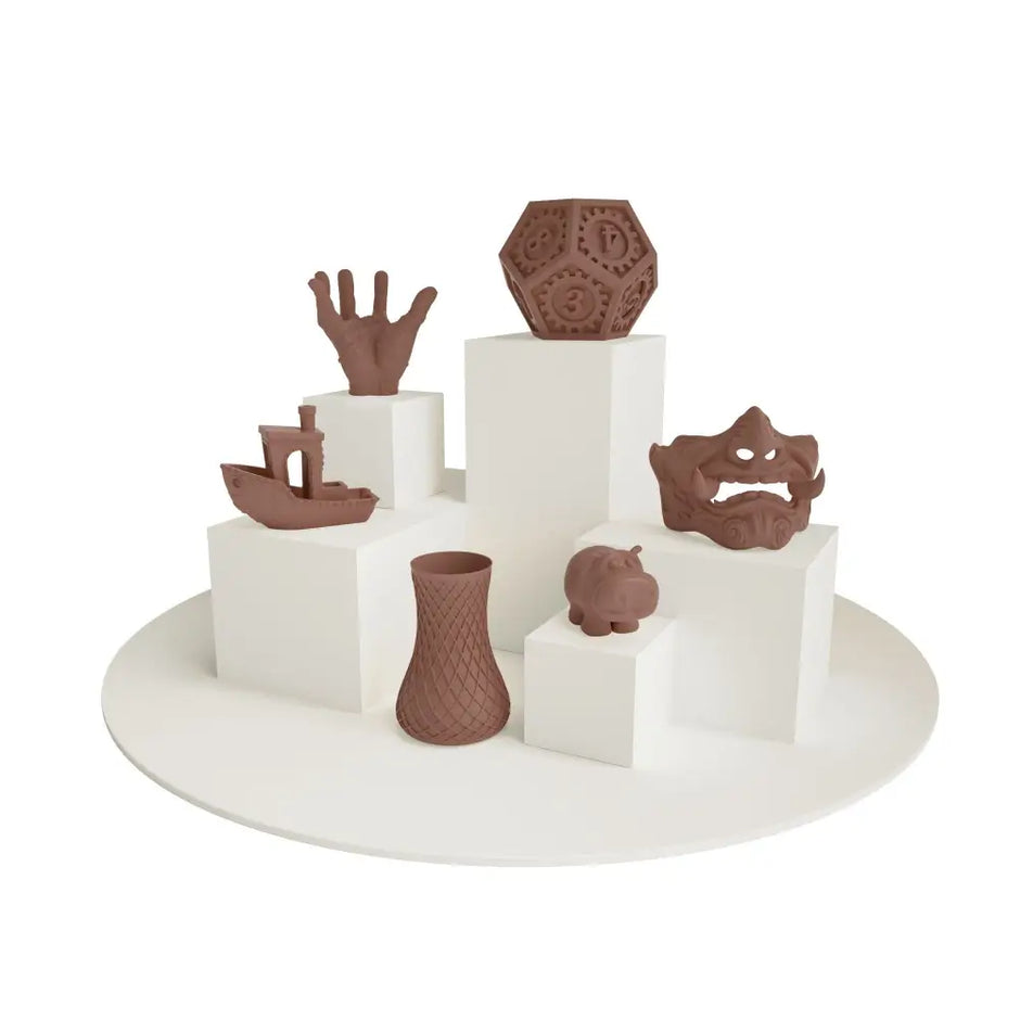 Brown PLA filament 1.75 mm prints of ceramic figurines on pedestals