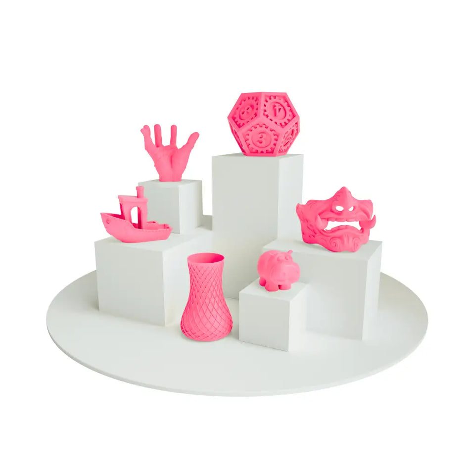 3D printed pink vase in PLA neon filament with intricate lattice design