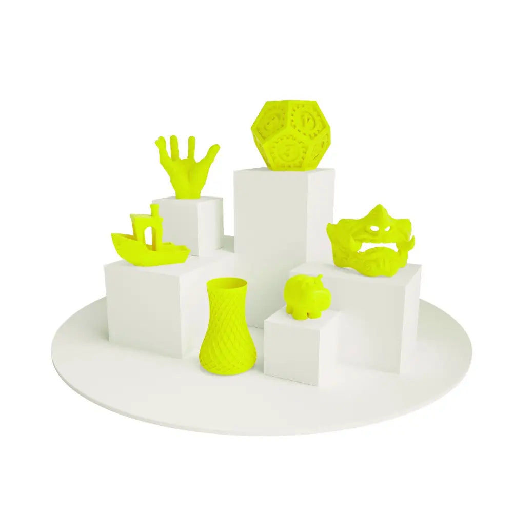 Neon filament display of seven 3D-printed objects using PLA Neon Filament