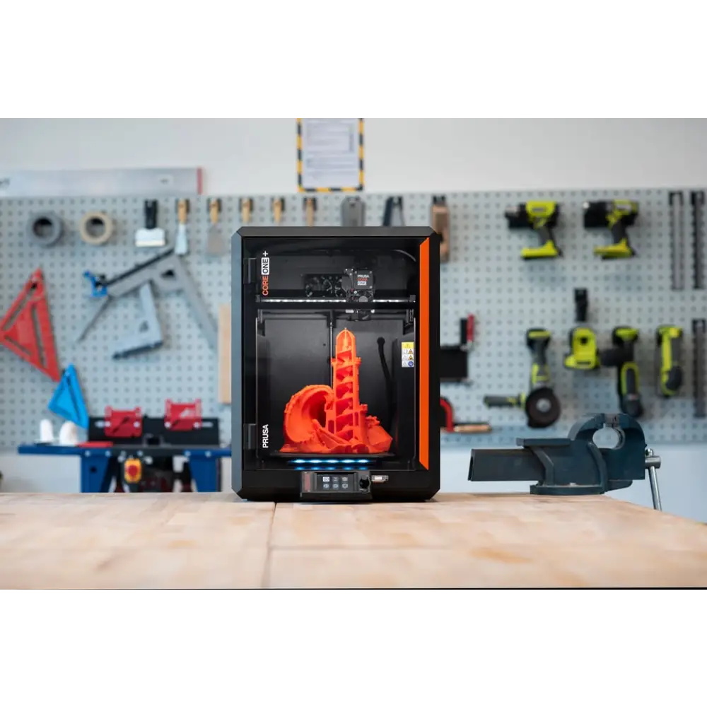 Prusa Core One Plus + 3D printer with orange black design and spiral print