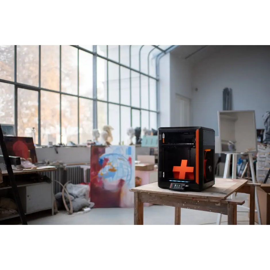 Prusa Core One Plus+ 3D printer with orange black accents and E3D V6 compatibility