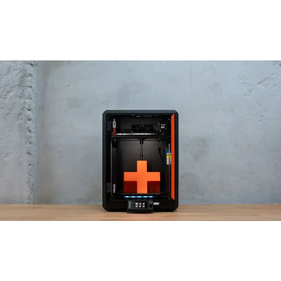 Prusa Core One Plus 3D printer with orange-black design and plus sign print