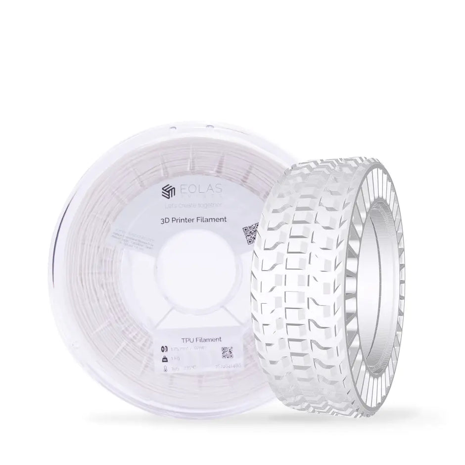 White spool of 3D printer filament with a tire-tread pattern visible on its side.