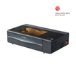Black xTool P2S 55W Desktop CO2 Laser Cutter with transparent lid and red power light
